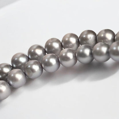 Takashi Akoya pearl necklace and matching earrings with silver clasp featuring 7.5-7 mm pearls