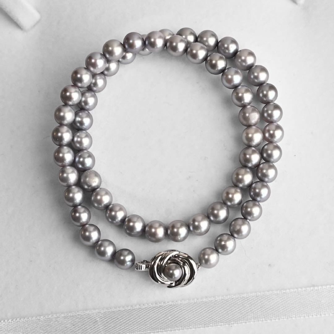 Takashi Akoya pearl necklace and matching earrings with silver clasp featuring 7.5-7 mm pearls