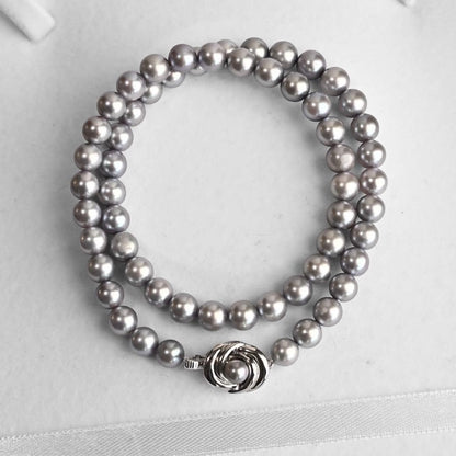 Takashi Akoya pearl necklace and matching earrings with silver clasp featuring 7.5-7 mm pearls