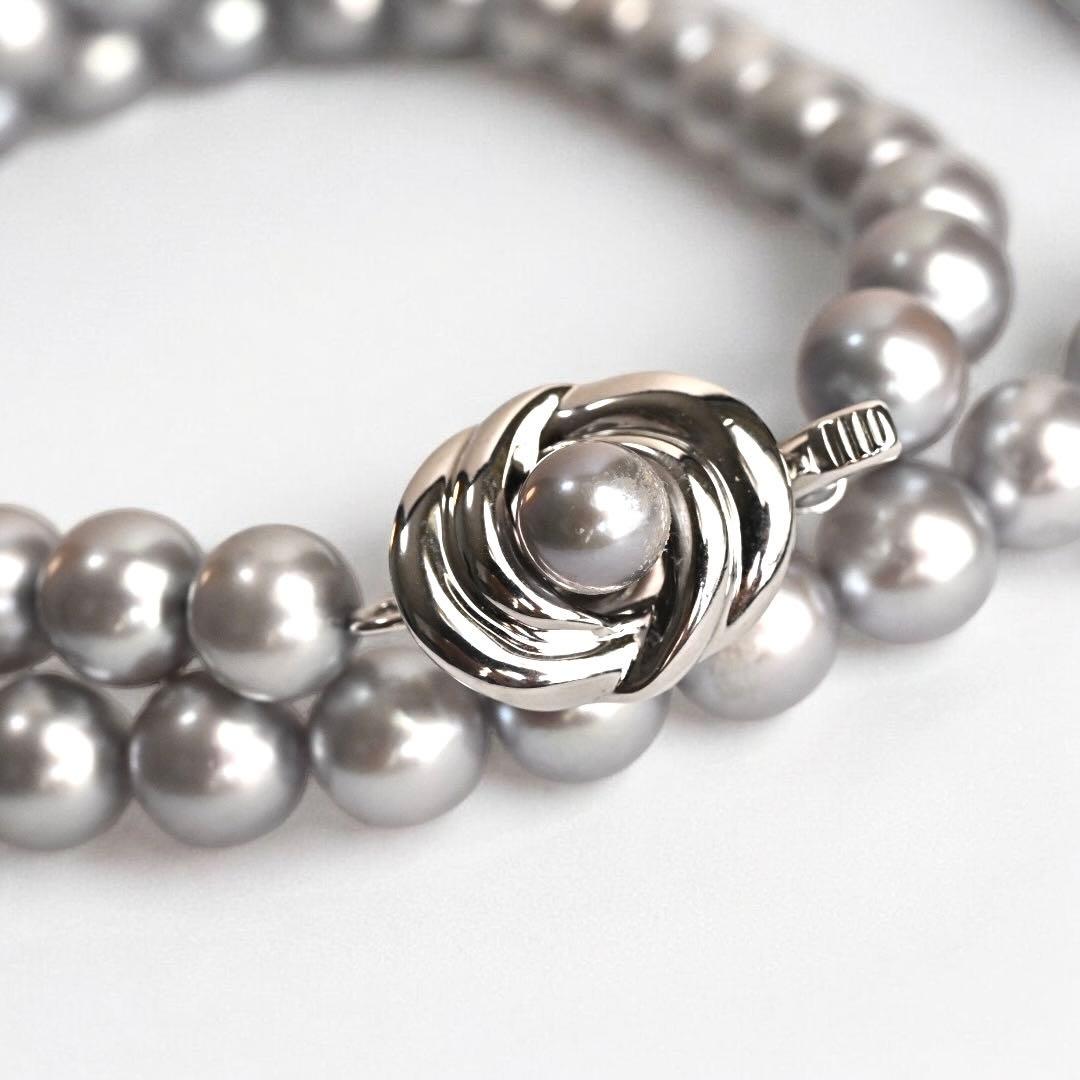 Takashi Akoya pearl necklace and matching earrings with silver clasp featuring 7.5-7 mm pearls