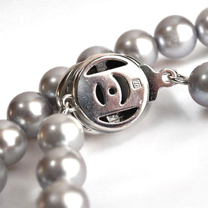 Takashi Akoya pearl necklace and matching earrings with silver clasp featuring 7.5-7 mm pearls