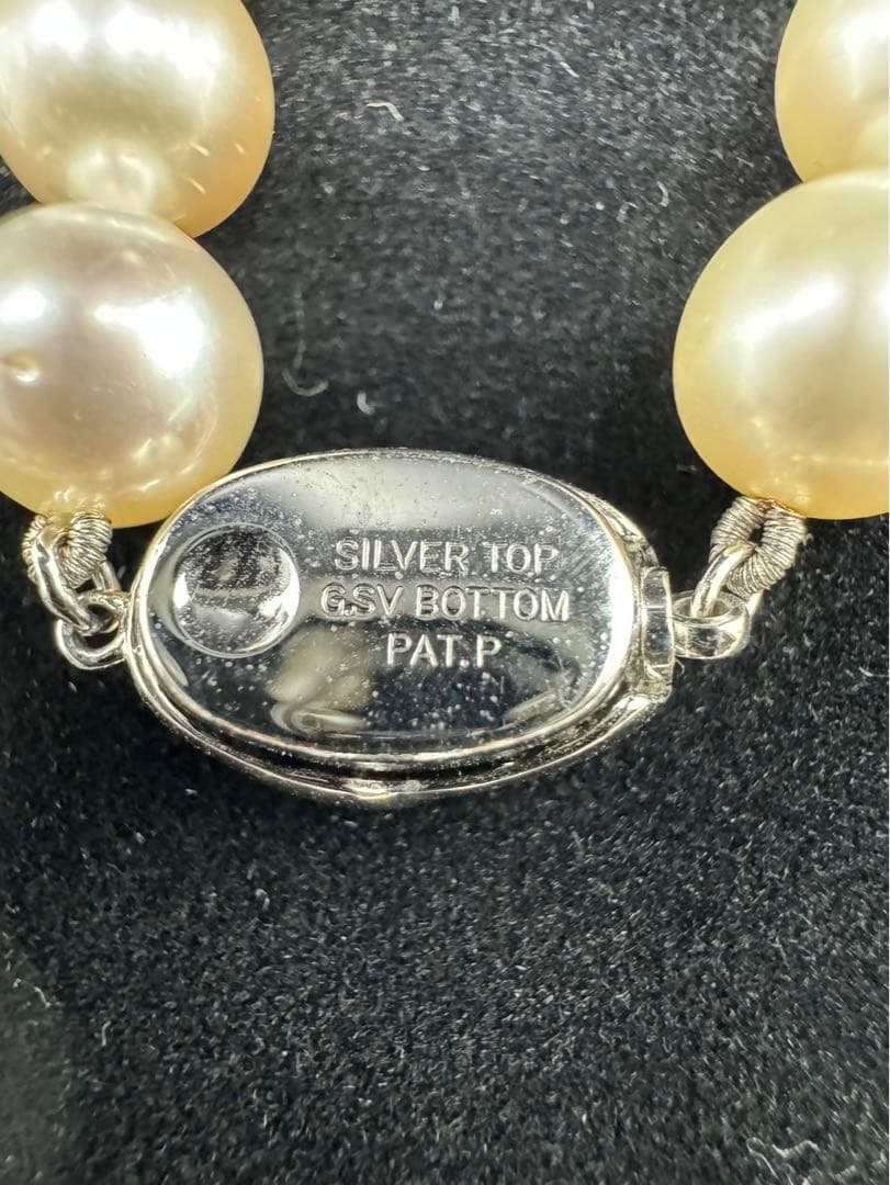 Akoya pearl silver necklace and diamond ring set with pearls sized 8.5 to 9.0 mm displayed on white background