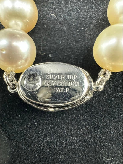 Akoya pearl silver necklace and diamond ring set with pearls sized 8.5 to 9.0 mm displayed on white background