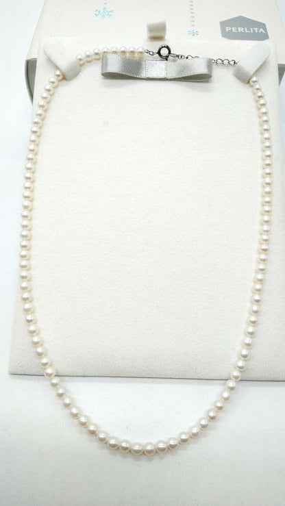 MIKIMOTO Perlita Pearlita three-piece jewelry set with two-strand necklace featuring baby pearls on silver and K18 gold