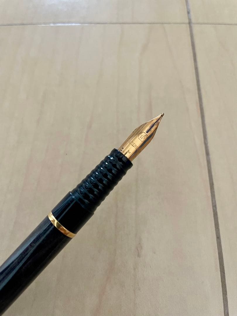 WATERMAN fountain pen black with marble-like finish, model M, made in France displayed on white background