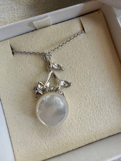 Tasaki Mabe Pearl pendant necklace with 13mm pearl and 42cm chain on white background