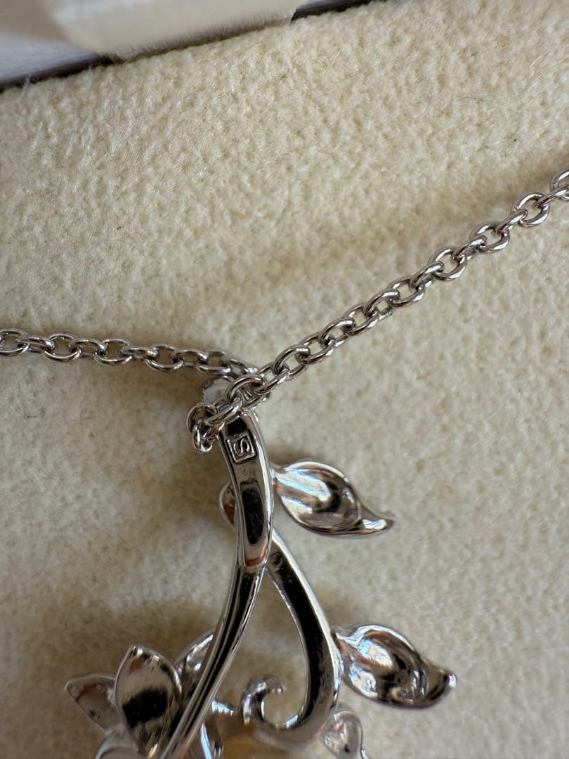 Tasaki Mabe Pearl pendant necklace with 13mm pearl and 42cm chain on white background
