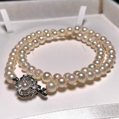 Akoya pearl necklace with 6.0-6.4mm round white pearls on a 42.2 cm silver chain