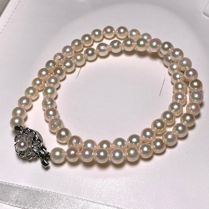 Akoya pearl necklace with 6.0-6.4mm round white pearls on a 42.2 cm silver chain