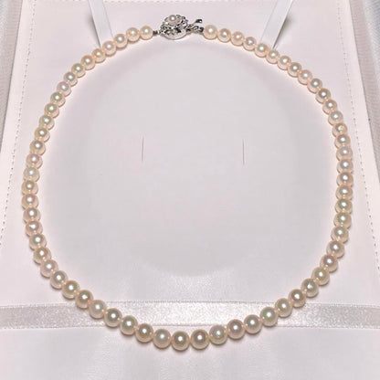 Akoya pearl necklace with 6.0-6.4mm round white pearls on a 42.2 cm silver chain