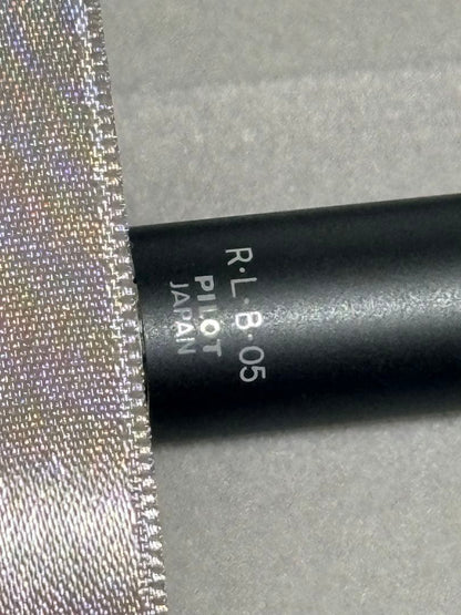 Pilot Mechanical Pencil Pen R-L-B-05 in black, red, and blue with rotating feature