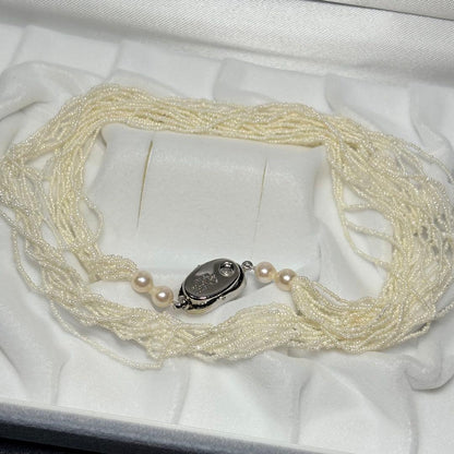 Kewai-Style Akoya Pearl Necklace 51cm length with small 1mm pearls displayed with certificate and jewelry box