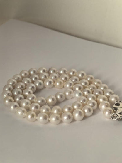 Akoya pearl necklace featuring 6-6.5mm pearls and flower pattern on 43cm 925 silver chain
