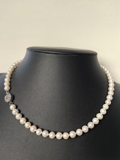 Akoya pearl necklace featuring 6-6.5mm pearls and flower pattern on 43cm 925 silver chain