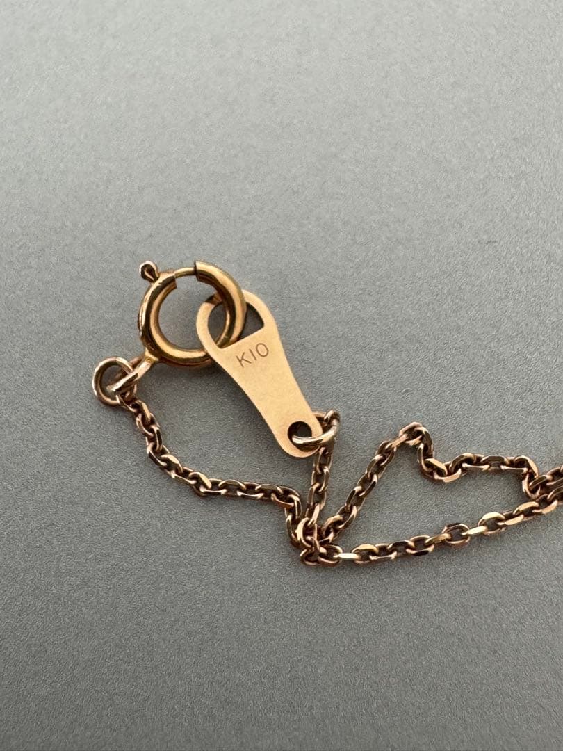 Agete K10 pink gold diamond cross necklace with center and vertical line diamonds on a 40 cm chain