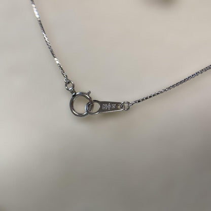 Tasaki platinum necklace with 10mm large pearl and 4 square cut diamonds on 40 cm chain
