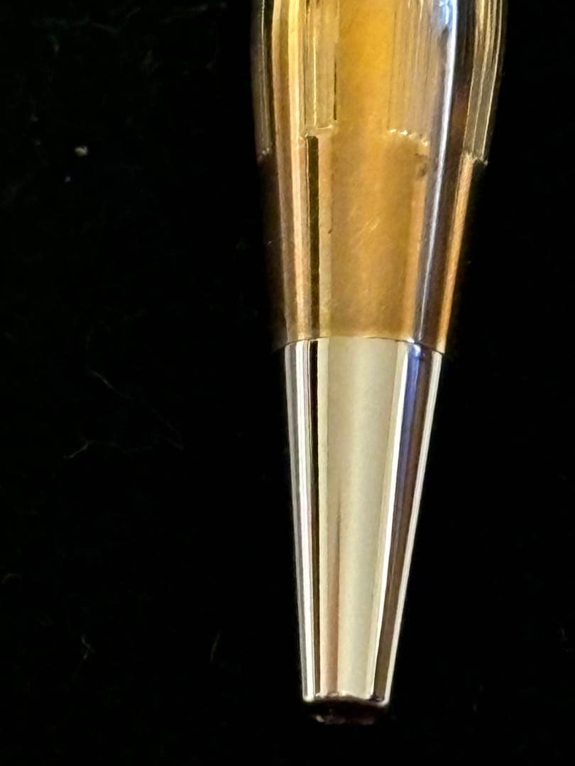 Gold CROSS ballpoint pen model クロ with sleek design and smooth finish