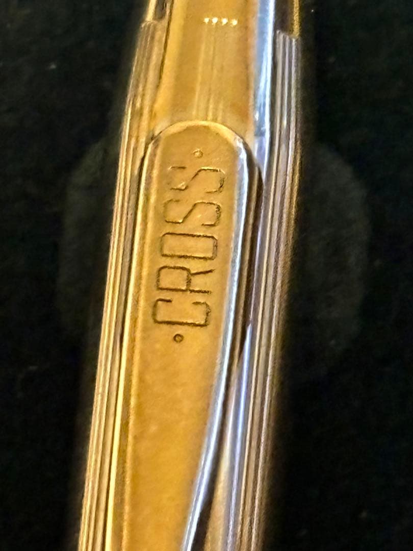 Gold CROSS ballpoint pen model クロ with sleek design and smooth finish