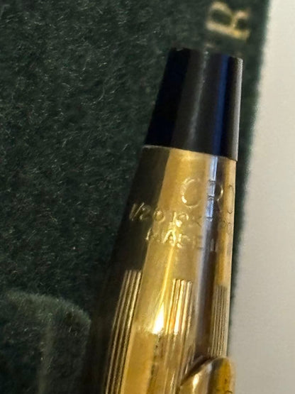 Gold CROSS ballpoint pen model クロ with sleek design and smooth finish