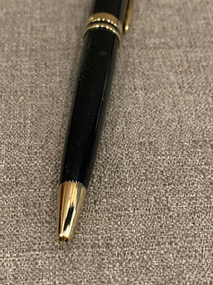 WATERMAN retractable black ballpoint pen with included case showing pen and case exterior