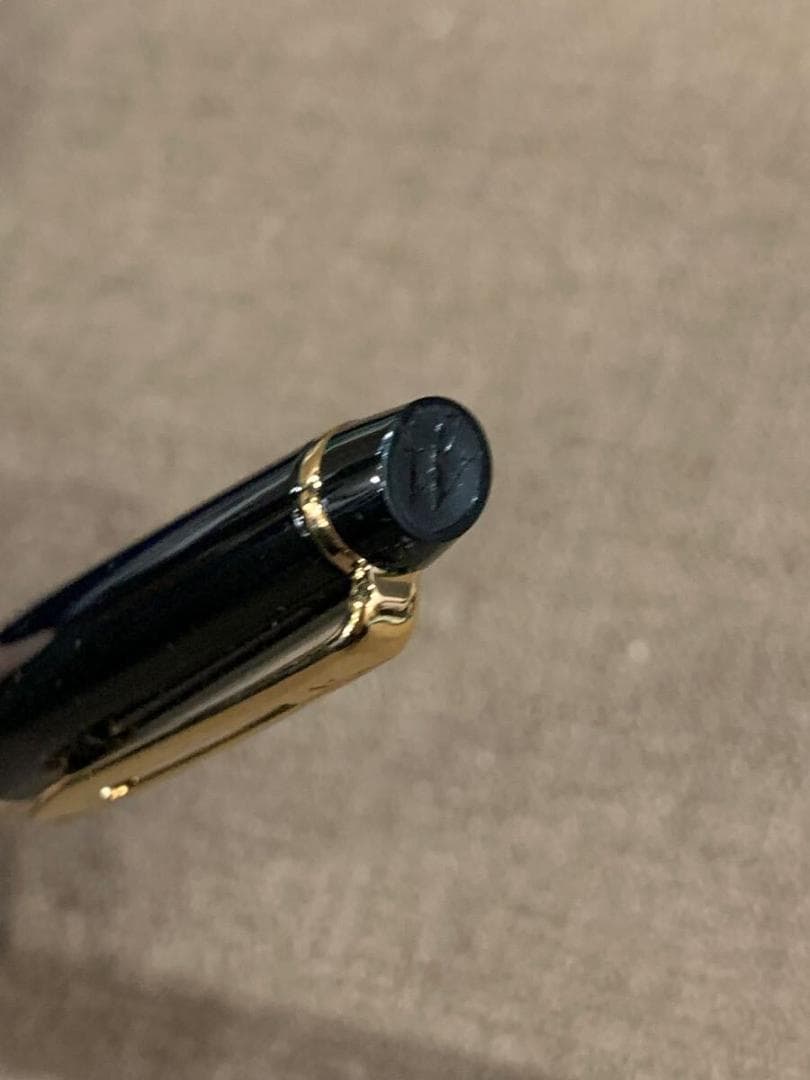 WATERMAN retractable black ballpoint pen with included case showing pen and case exterior