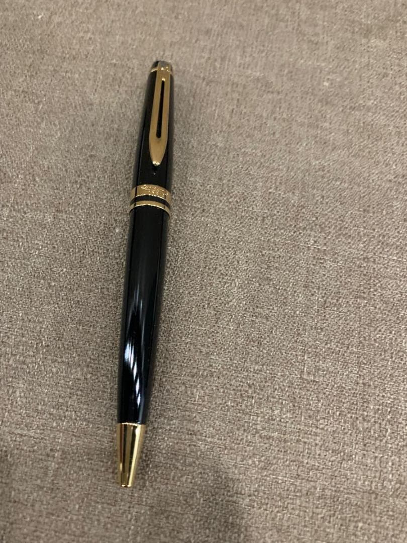 WATERMAN retractable black ballpoint pen with included case showing pen and case exterior