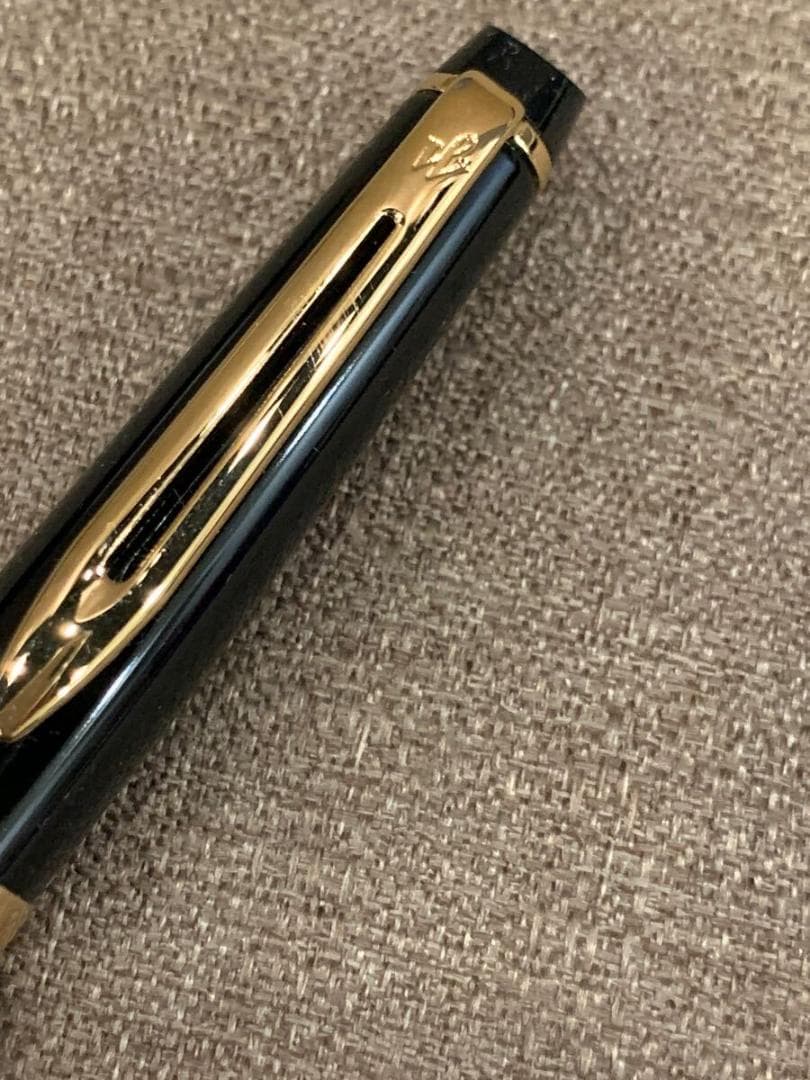 WATERMAN retractable black ballpoint pen with included case showing pen and case exterior