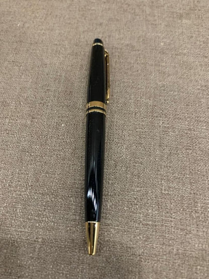 WATERMAN retractable black ballpoint pen with included case showing pen and case exterior