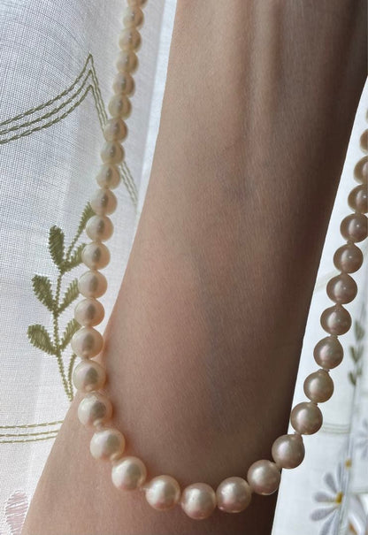 Akoya pearl necklace and matching earrings with 7mm pearls on a 44cm k14 white gold chain with silver clasp