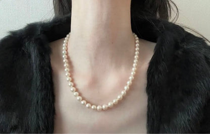 Akoya pearl necklace and matching earrings with 7mm pearls on a 44cm k14 white gold chain with silver clasp