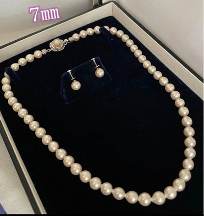 Akoya pearl necklace and matching earrings with 7mm pearls on a 44cm k14 white gold chain with silver clasp
