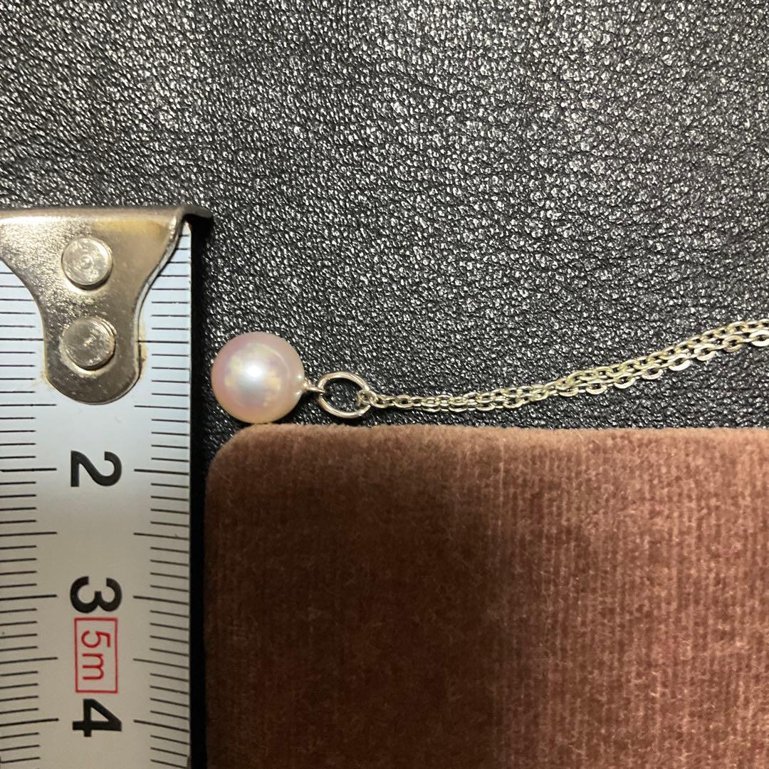 Mikimoto Akoya pearl necklace with silver pendant displayed with dedicated case