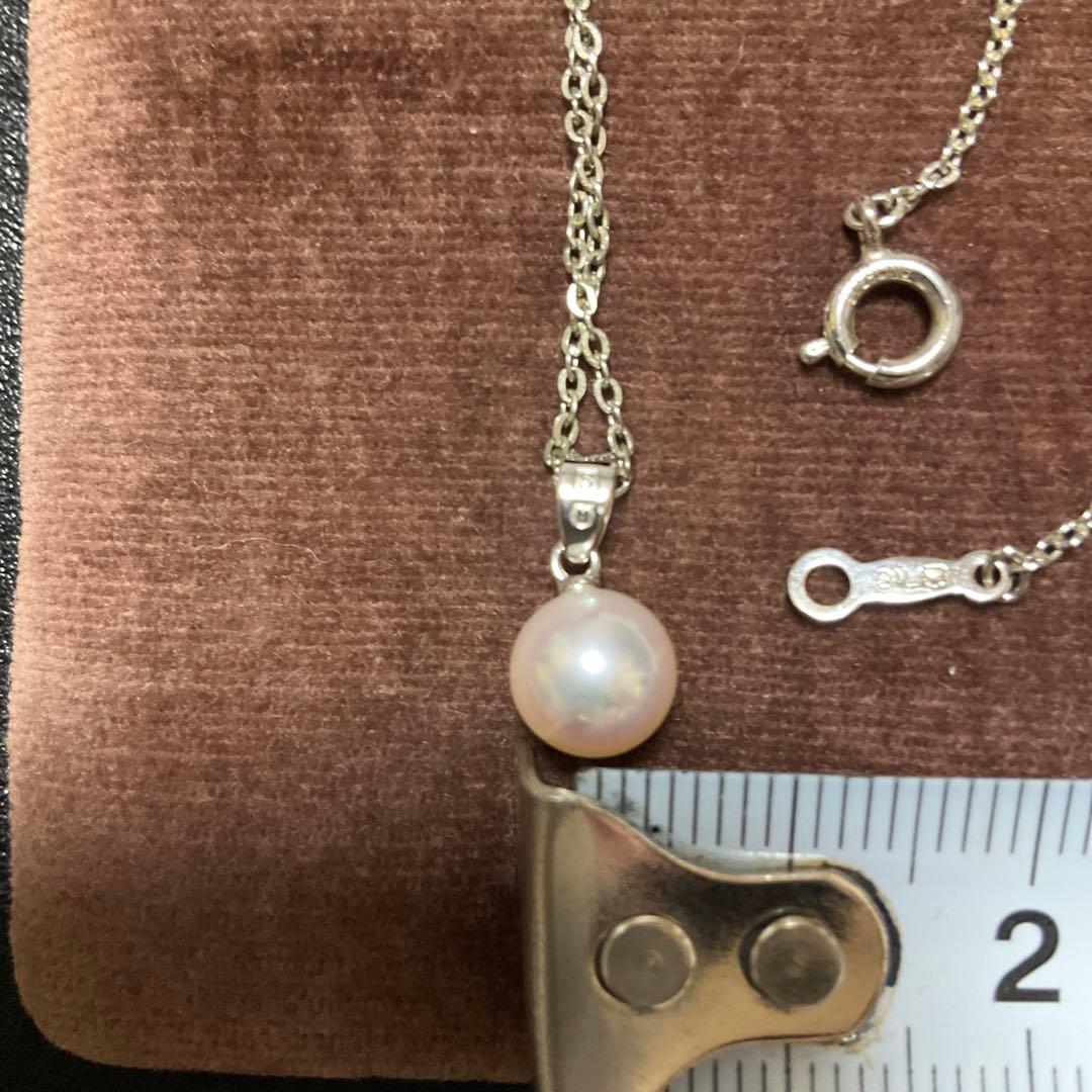 Mikimoto Akoya pearl necklace with silver pendant displayed with dedicated case