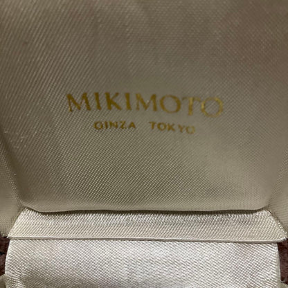 Mikimoto Akoya pearl necklace with silver pendant displayed with dedicated case