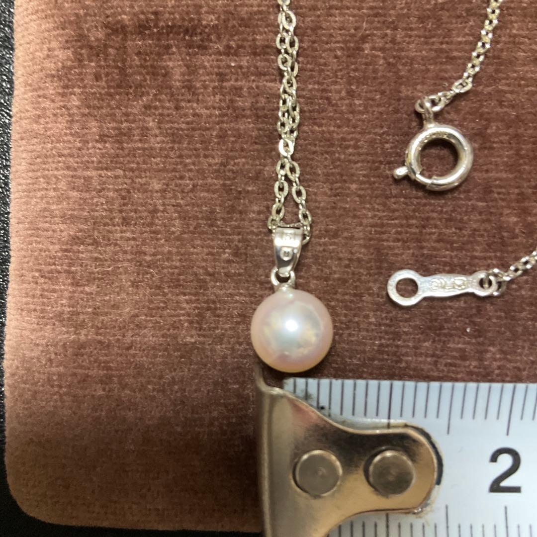 Mikimoto Akoya pearl necklace with silver pendant displayed with dedicated case