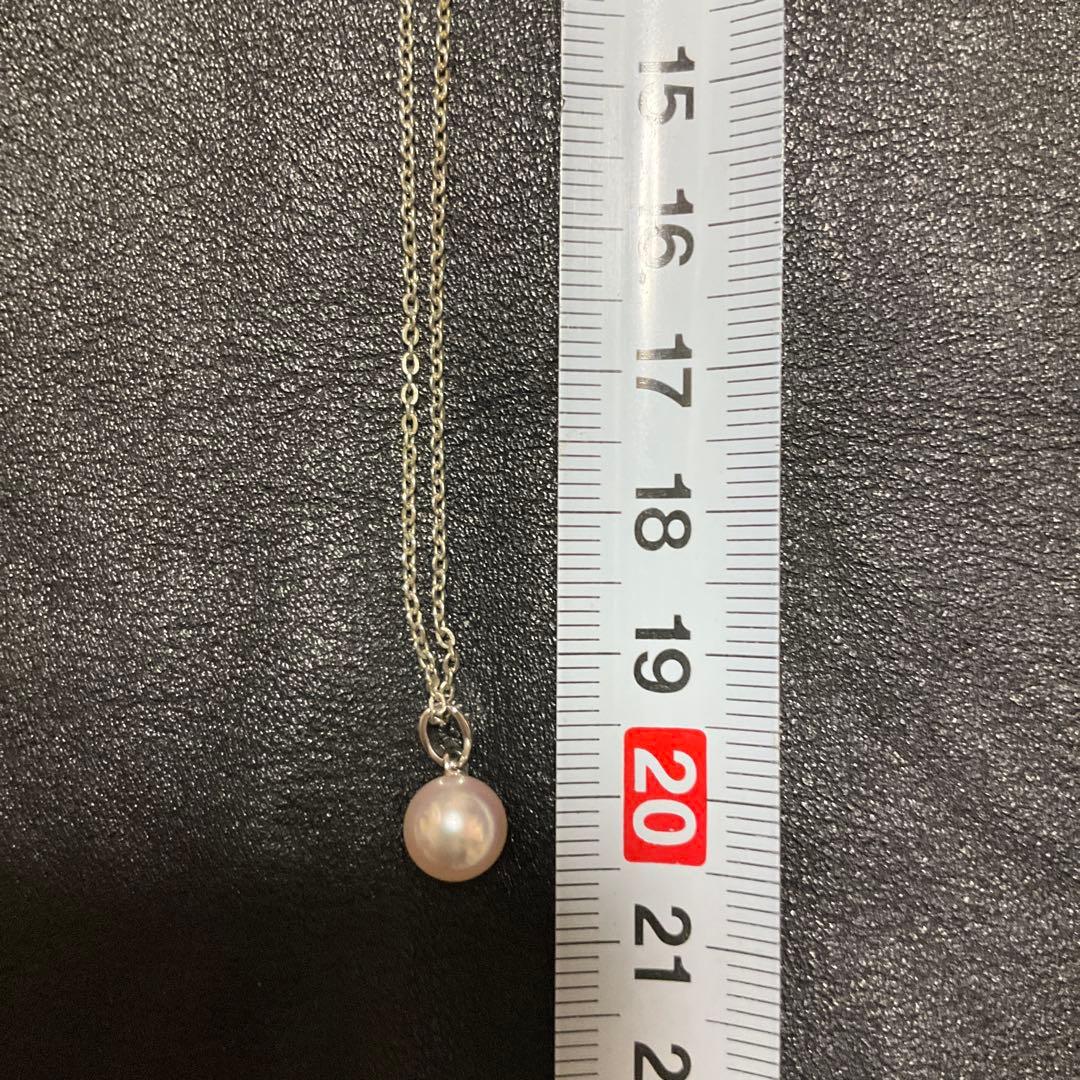 Mikimoto Akoya pearl necklace with silver pendant displayed with dedicated case