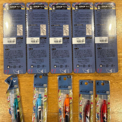 Jujutsu Kaisen themed Dr. Grip 0.5mm ballpoint pen set featuring blue orange and red pens with graphite tips