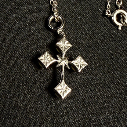 Mikimoto Akoya pearl cross necklace in silver with 19mm pearl and 42cm chain displayed on white background