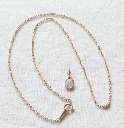 Chain Agete charm featuring topaz and diamond stones set in K10 gold with tourmaline, size 0.8 cm x 0.6 cm