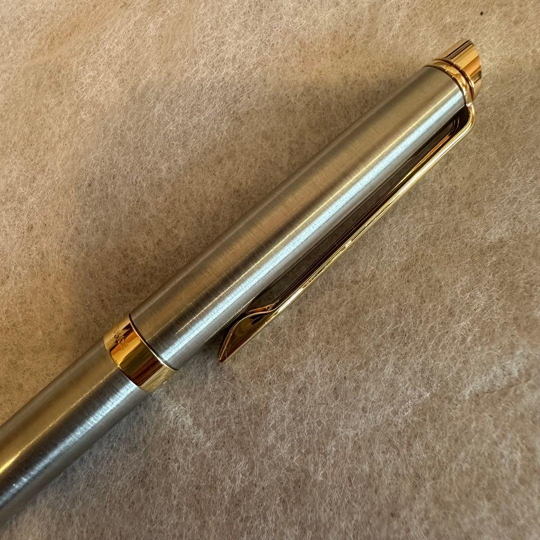 Waterman Ballpoint Pen with sleek black body and silver accents, measuring 14 cm long