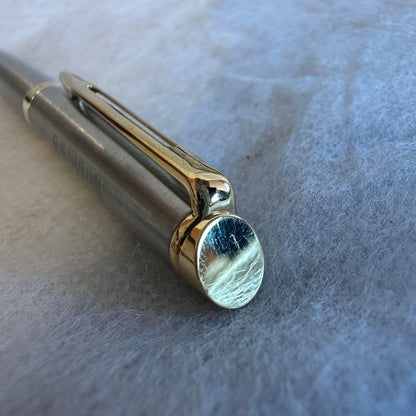 Waterman Ballpoint Pen with sleek black body and silver accents, measuring 14 cm long
