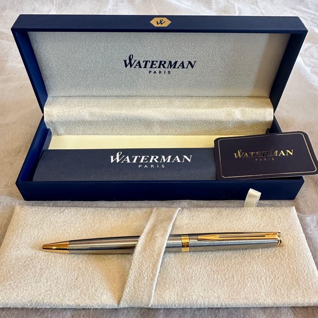 Waterman Ballpoint Pen with sleek black body and silver accents, measuring 14 cm long