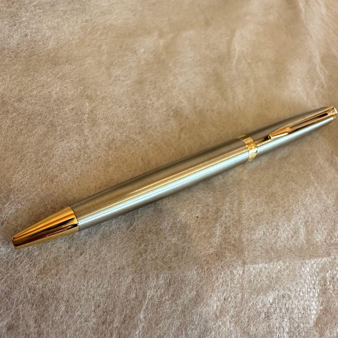 Waterman Ballpoint Pen with sleek black body and silver accents, measuring 14 cm long