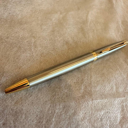 Waterman Ballpoint Pen with sleek black body and silver accents, measuring 14 cm long