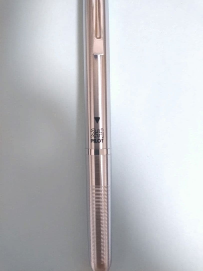 Pilot 2+1 Pendulum multi-function pen with stainless steel body, red and black 0.5mm refills, shown in main photo