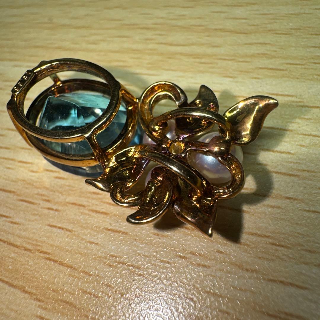 Tasaki necklace with 15.68ct blue topaz, pearl top, and small diamonds set in K18 gold