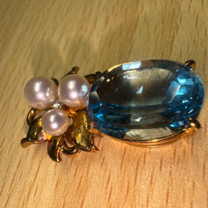 Tasaki necklace with 15.68ct blue topaz, pearl top, and small diamonds set in K18 gold