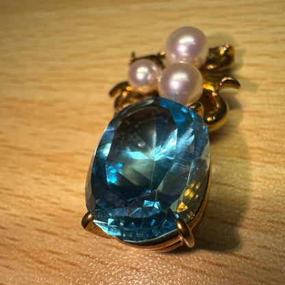 Tasaki necklace with 15.68ct blue topaz, pearl top, and small diamonds set in K18 gold