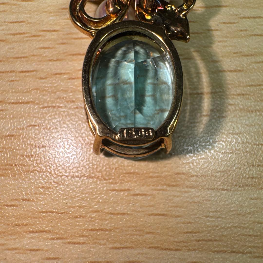Tasaki necklace with 15.68ct blue topaz, pearl top, and small diamonds set in K18 gold