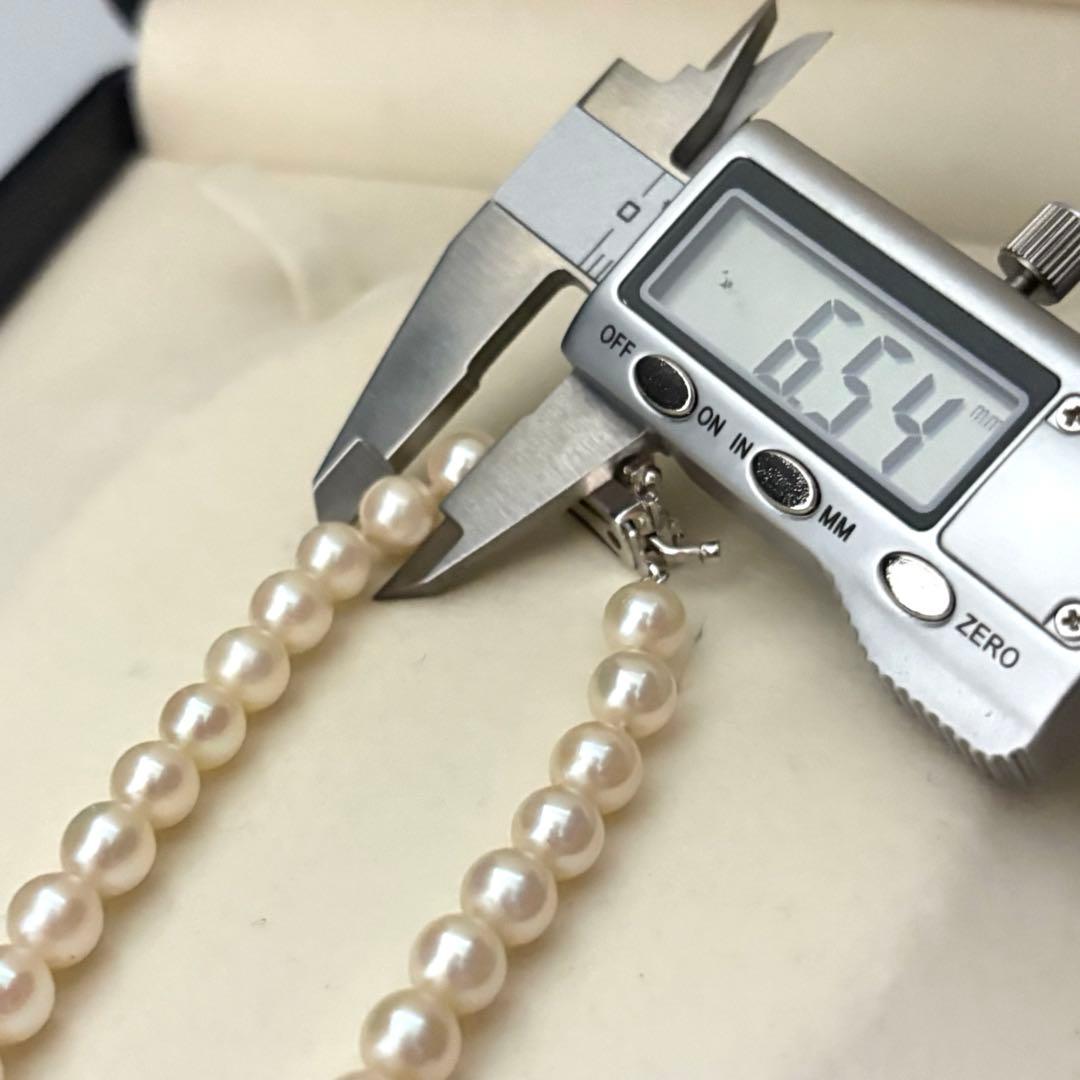 Akoya pearl necklace with 6.5-7.0mm round pearls in champagne gold color, 43cm length